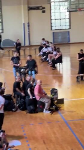 Fashion show takes over a Milan gymnasium basketball court