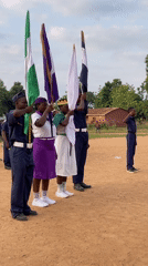 Flag ceremony held in Tabu Nigeria with uniformed personnel