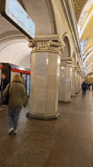 Morning commute documented at ornate Moscow metro stations