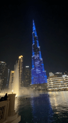 Burj Khalifa displays Chinese characters in blue illumination show