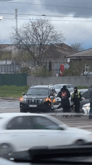 Wet streets, damaged buildings, traffic incident documented in Kharkiv