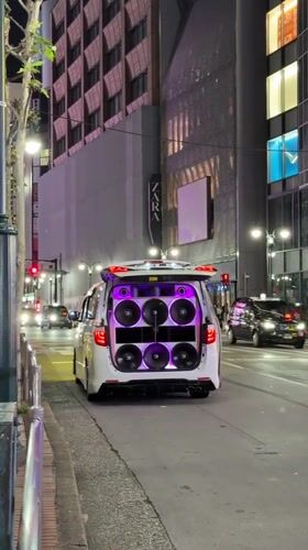 Modified luxury cars gather in Shibuya shopping district