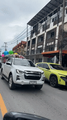 Balloon-decorated pickup truck spotted carrying blankets in Thailand