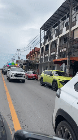 Balloon-decorated pickup truck spotted carrying blankets in Thailand