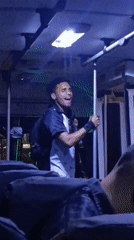 Man performs on bus in Porlamar, Venezuela
