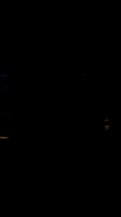 Crowd gathers in dimly lit club venue in Mexico City