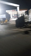 Nighttime street activity captured around Lokoja gas station