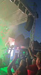 Spigiboy performs live under colorful stage lights in Hévíz
