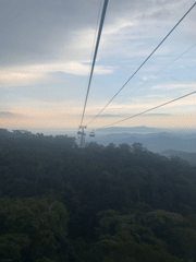 Cable car operates through forested mountains near Đà Nẵng