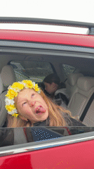 Children play around cars in Chaikovsky garage workshop