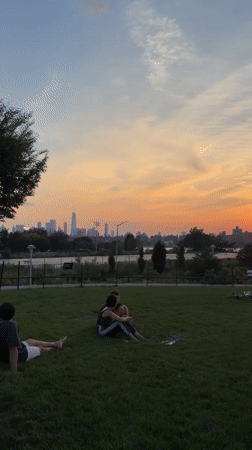 Sunset drumming and skyline watching at a NYC waterfront park