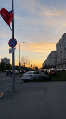 Evening traffic flows through Saint Petersburg streets at sunset