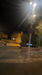Fire truck speeds through Barcelona streets at night