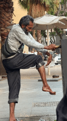 Casual street life documented in Barcelona urban square