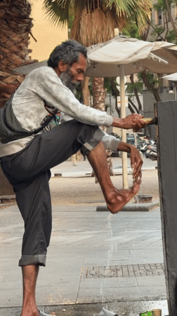 Casual street life documented in Barcelona urban square
