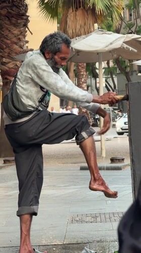 Casual street life documented in Barcelona urban square