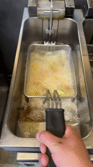 Zucchini frying observed in Badia del Vallès kitchen