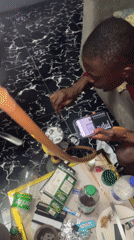 Late-night hookah session indoors in Abuja, Nigeria