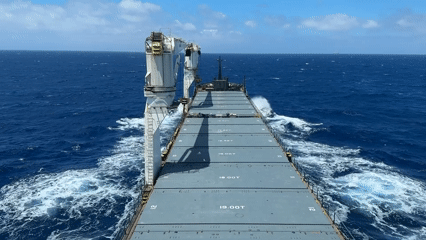 Cargo ship with cranes observed sailing Mediterranean waters