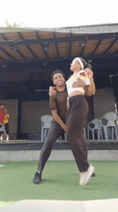 Outdoor dance performance near a stage in Porlamar, Venezuela