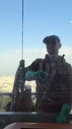 Cleaning crews maintain buildings in Al Jizah, Jordan