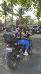 Motorcycle stunts and children's train spotted in Buruan parking area