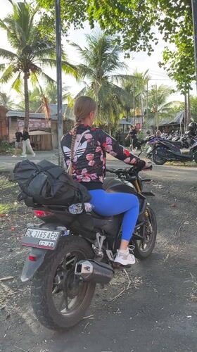 Motorcycle stunts and children's train spotted in Buruan parking area