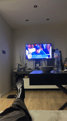 Sofia resident enjoys quiet evening watching TV at home