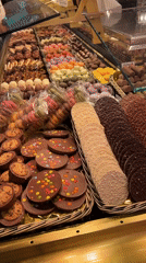 Ordinary afternoon unfolds across Barcelona's central squares and markets