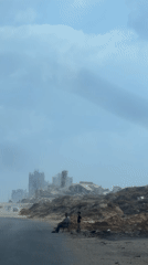 Street-level scenes from a heavily damaged Gaza neighborhood