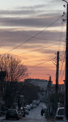 Sunset colors illuminate quiet street scene in Harmanli