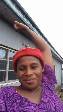 Morning in Rido: posing for camera, then hauling a sack through cornfields