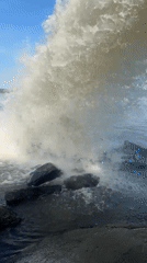 Woman takes selfies at dramatic water discharge site in Russia