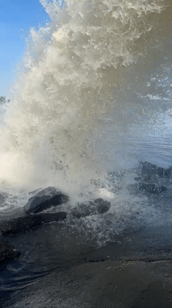 Woman takes selfies at dramatic water discharge site in Russia
