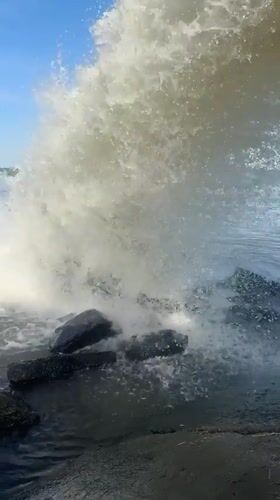 Woman takes selfies at dramatic water discharge site in Russia