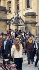Graduation ceremony draws crowds near ornate gate in Oxford