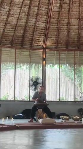 Sound bath and gong healing session at a Ko Samui pavilion