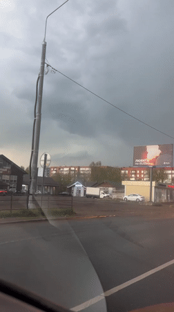 Rainy afternoon traffic captured in Klin, Russia