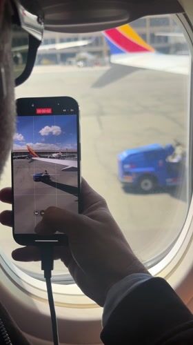 Traveler records video at Honolulu airport terminal