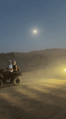 Sunset ATV ride into a Sinai desert night camp