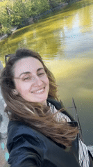 Woman photographed by water in Kryvyi Rih, Ukraine