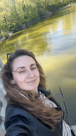 Woman photographed by water in Kryvyi Rih, Ukraine