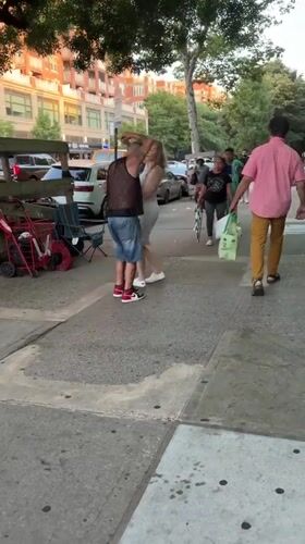 Sidewalk dancing and a deli food counter, Brooklyn.