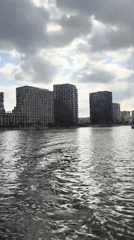 Moscow riverfront: boats, cranes, and a sculpture walk