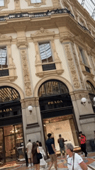 Busy morning crowds documented at Milan's historic Duomo and Galleria