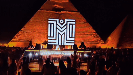 Nighttime event staged at illuminated Great Pyramids of Giza