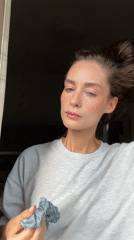 Woman enjoys banana pastry breakfast in Kiel kitchen