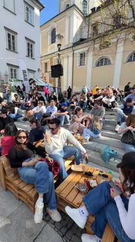 Daily life captured across Ljubljana's markets, cafes, streets