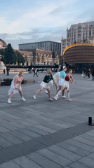 Dance group performs synchronized routine in Moscow plaza
