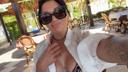Women enjoy beachside lunch, take selfies in Montenegro